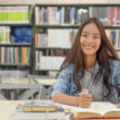 female-students-are-searching-research-papers_40919-909